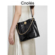 Kouyi Niche Design léger Luxury Commuter Bodet Bac Femme Bag 2025 Nouveau sac d'épalas au début du printemps noir noir