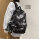NBA CARES-NIKE书包新款背包六年级初中生潮流高颜值大容量百搭耐脏涂鸦双 耐克NIKE-5009nk满天星黑色 耐克NIKE-带毛绒铃铛挂件