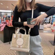 CoaCH (COACH) domestic spot coachDempsey22 Valentine's Day milk tea khaki 30 single-shoulder old-fashioned denim tote bag Dry rose pink small 22*20*11cm
