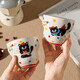 Cartoon cat holding coffee cup, lady's good-looking mug, latte cup, ceramic cup, household water cup, holding coffee cup + red edge saucer