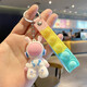 Space Rabbit's New Keychain Doll Pends para la exquisita bolso escolar de las mujeres Adorno colgante Lindo INS Cadena de llave Ring Ring Space Conejo con tira de cuero azul