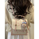 Dadong-Rucksack für Frauen reisen leichte und hochwertige 2025 Neue Cartoon Animation Street Trend Schoolbag Silber ohne Dekoration
