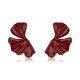 Qlady red skirt earrings women's silver needle earrings exaggerated European and American temperament earrings 2025 new high-end niche earrings