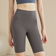 Pantalon de yoga Xueximan à 5 points pour les femmes avec des hanches à taille haute serrage resserrement des fesses de pêche au ventre