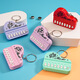 Enérgica Fun Class Fun Fishing Pequeños juguetes creativos Mini Electronic Electronic Piano Keychain colgante de colgante brillante Macaron en polvo