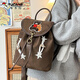 Rucksack im Woodpecker Academy Style 2025 Neue trendige und modische koreanische Nische -Reise -Leichtschule für Frauen für Frauen, die aus Braun gehen