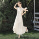 Silk Cypress Stand Collar Vestido 2025 Summer NUEVO TEMPERAMENTO DE Ropa para mujeres Bordado a la línea A-línea Irregular falda