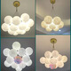 Nordic Simple Wohnzimmer Internet Prominente Beleuchtung Creme im Schlafzimmer Restaurant Planet Kronleuchter Zhongshan Home Dekoration Mondlampe 9734-schwarz 7-köpfige dreifarbige helle Ballkugel