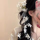 Dai Yan new Chinese style lily of the valley flower hairpin 2025 new simulated flower hairpin side clip vacation photo atmosphere headwear flower tassel side clip single