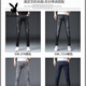 Playboy (Playboy) Jeans Slim Feet Pants de hombres rasgados de moda de moda