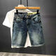 QLTQZQ pantalones cortos de mezclilla bordados hombres sueltos de lavado casual de verano 2025 mendigo rasgado de cinco puntos Azul N9902 Azules Azules de cinco puntos 28