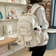 Double star schoolbag for female junior high school students and high school students large capacity backpack college style cute casual versatile computer backpack for men off-white with long leg biscuit pendant