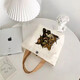[JD Logistics] Large capacity canvas bag women's fashionable shoulder bag bento bag cartoon handbag mommy bag three little bears 1 package [27*22*8cm]