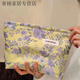 025 new yellow background purple flower niche cosmetic bag portable skin care product collection yellow background purple flower cosmetic bag
