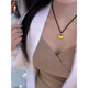 Model photo of 2025 new gold double C necklace Fat Fortune Gold Tuo 18k gold safety lock pendant braided rope for girlfriend Little Fat Fortune pendant small size + gold beads black rope