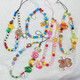 Original hand-made beaded mobile phone hanging chain lanyard cute child fun wrist short ccd camera chain hanging decoration cartoon Oriki Bear