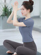 Yoga wear for women 2025 new top short-sleeved beautiful Pilates training running outer sports suit fitness women healing blue top + dove gray pants suit M 100-110