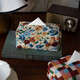 Fantasy contrasting color small flower tissue box high-end desktop tissue box light luxury home living room high-value storage box ins style Shishi Ruyi black light coffee color