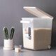 Camellia rice bucket rice storage box flour bucket with measuring cup with bottom pulley 30 Jin Jin equals 0.5 kg (with measuring cup)