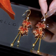 Idel red maple leaf earrings for women 2025 new trendy high-end long tassel retro light luxury design earrings Maple leaf ear hook style E2551