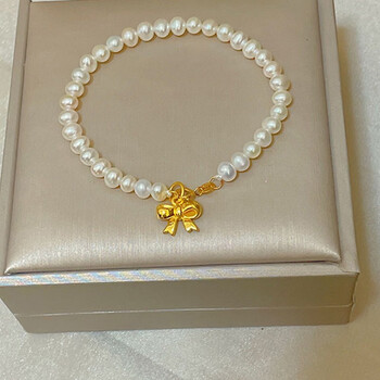 欧颜黄金蝴蝶结手链女999足金珍珠手串ins风时尚设计首饰品生日七夕