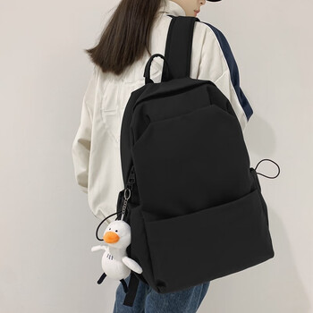简约中学女生大容量休闲旅行防刮耐磨笔记本电脑包黑色带大白鸭挂件
