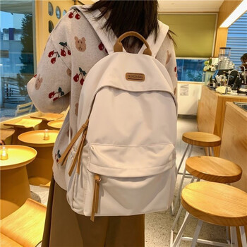 诺石双肩包女新款大容量书包中学生日系简约休闲双肩背包品牌入会