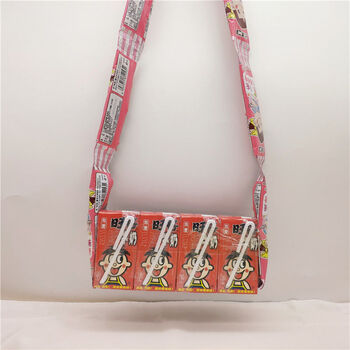 做的背包个包包阿尔卑斯不二家棒棒糖加ad钙奶旺仔牛奶连起来糖果背包