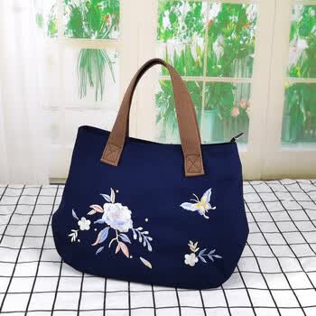 途尊(kingtrip) 新款刺绣手拎包帆布包中年妈妈包女士休闲手提包上班