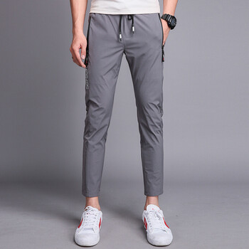 英伦班纳夏季新款休闲运动裤速干弹力修身青年裤男韩版系绳小脚九分裤