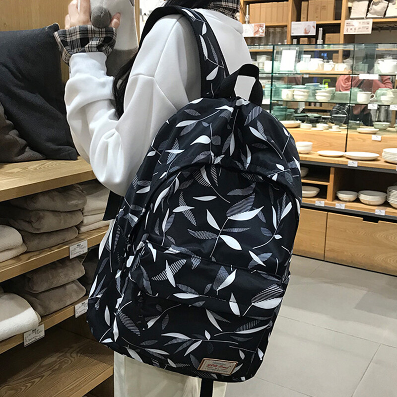 Landcase schoolbag female Korean junior high school student Canvas Backpack male high capacity college wind high school student printed travel computer backpack 1895 leaf black