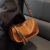 酷奇袋鼠（KUQIDAISHU）经典手提包包女2023新款潮时尚洋气宽带斜挎包小众枕头包女 咖啡色