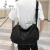袋鼠（KANGAROO）轻奢品牌大容量复古帆布斜挎包男背包日系休闲邮差包学生单肩包旅 黑色大号 3182