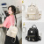 酷奇袋鼠（KUQIDAISHU）品牌软皮双肩包女2022新款时尚韩版潮包印花书包旅行包小背包 小鹿款-白色(+手包)