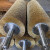 定制镀铜钢丝辊工业圆形滚筒刷抛光除锈去毛刺缠绕硬毛不锈钢丝刷 圆孔纽丝纶