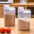 杂粮收纳盒家用五谷粮食储物罐米桶厨房食品储存装豆子塑料密封罐 透明手1个装 密封刻度控量