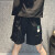 耐克（Nike）女子短裤2024夏季新款小雏菊刺绣梭织透气宽松休闲工装运动五分裤 HJ9424-010黑色 S
