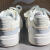 李宁（LI-NING）休闲鞋男女同款2024夏季新款80S经典小白鞋舒适运动鞋AGCU055/040 乳白色+浅石灰男款 AGCU055-1 39