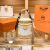 MK香港品牌女包轻奢水桶包2024新款潮圆柱手提斜挎单肩圆筒包包 米白色
