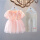 粉红色裙子+七分裤