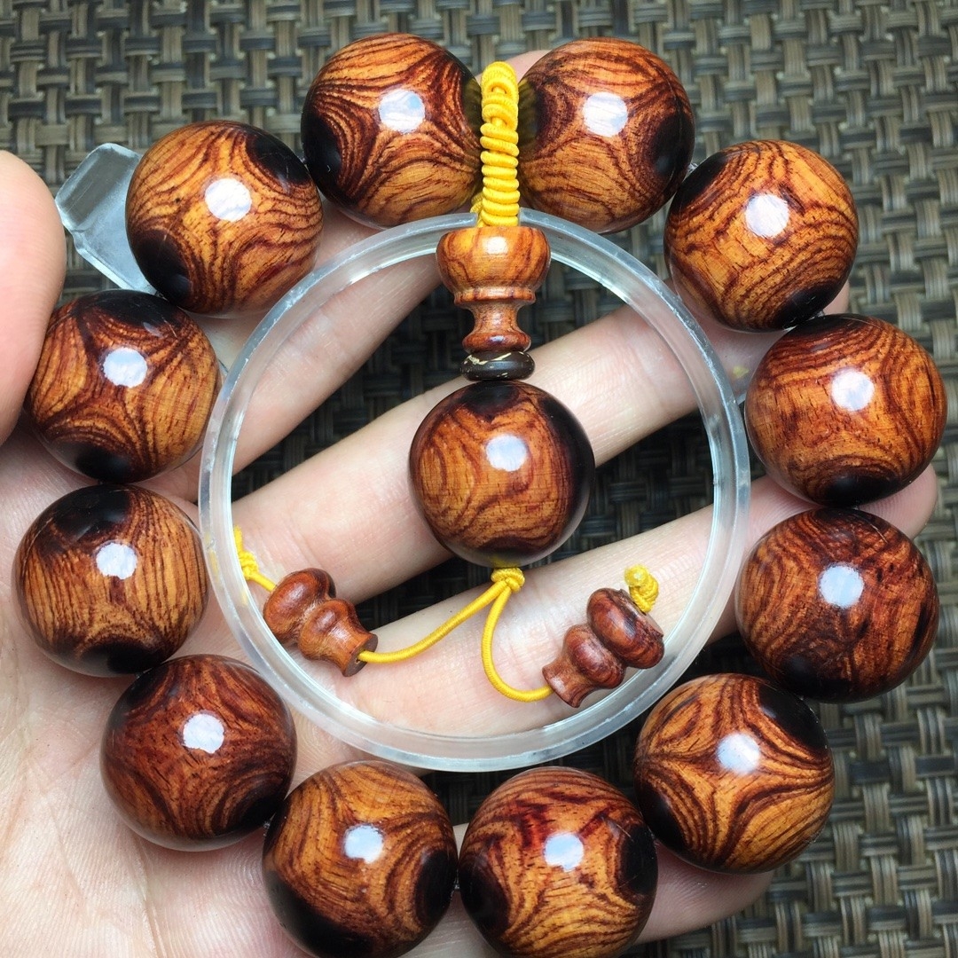 特级老挝黄花梨鬼脸对眼手串