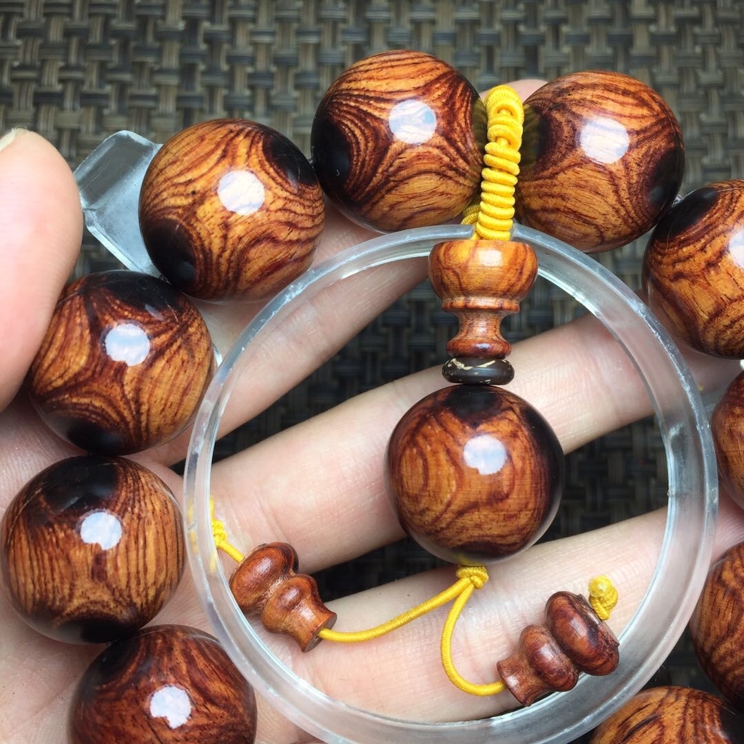 特级老挝黄花梨鬼脸对眼手串