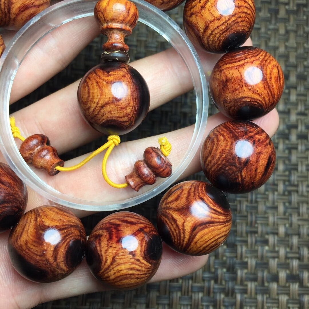 特级老挝黄花梨鬼脸对眼手串